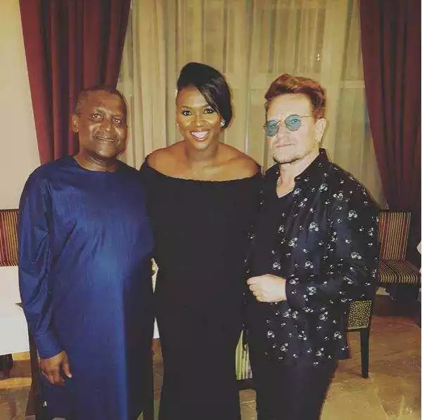 Singer Waje Gifted With A Bible As She Poses With Bono And Aliko Dangote